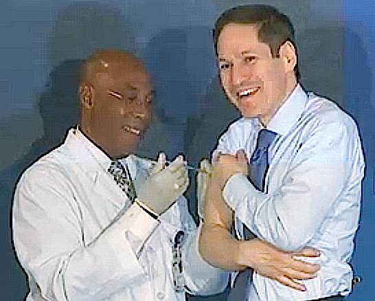 CDC Director Tom Frieden, MD, MPH, gets his flu shot at a press conference.