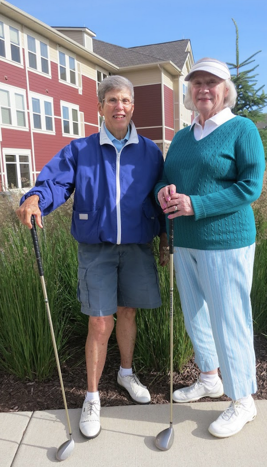 Rainy Abbott and Joyce Wong enjoy golfing together.