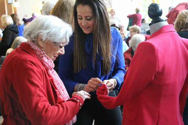 Image consultant Monica Flaum, center, offers personal style tips to a resident.