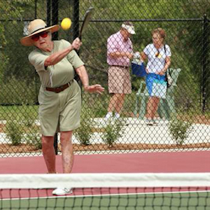 Dee Grace demonstrates her paddle technique on Morningside’s new pickleball court.