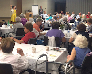 Residents of Orchard Cove participate in an event focusing on the 2016 election.