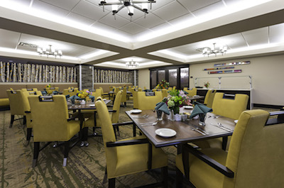 The Cottonwood Place Senior Living dining room features biophilic design.