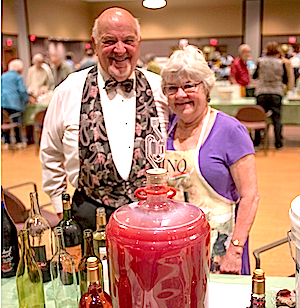Richard and Donna Brandt show their homemade wine.