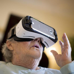An assisted living resident tries the virtual reality system. (Photo: MIT)