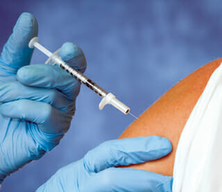 Mandate flu vaccination for long-term care workers and residents, group recommends