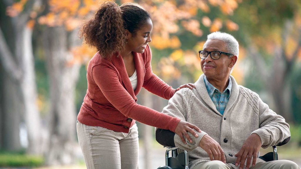Pandemic drives increase in programs that compensate family caregivers, AARP reports