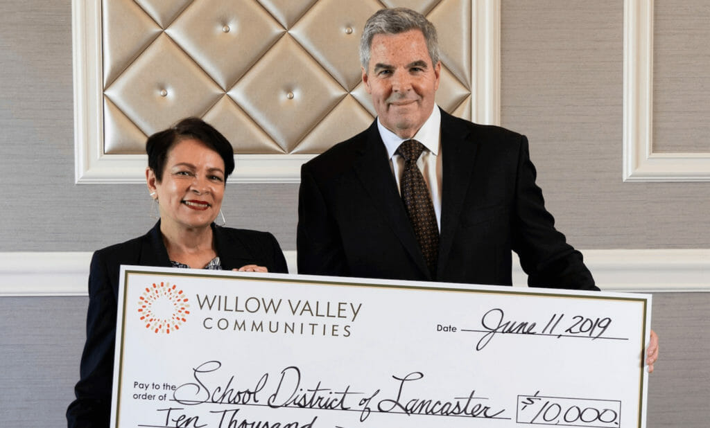 Retirement community’s donation helps high school graduates pay college fees