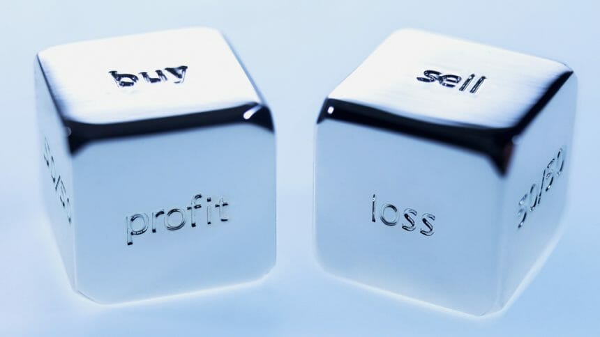Close up silver cubes with sayings on them