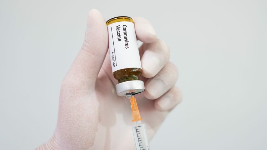 needle in vaccine vial