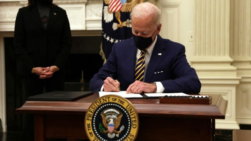President Biden signs something