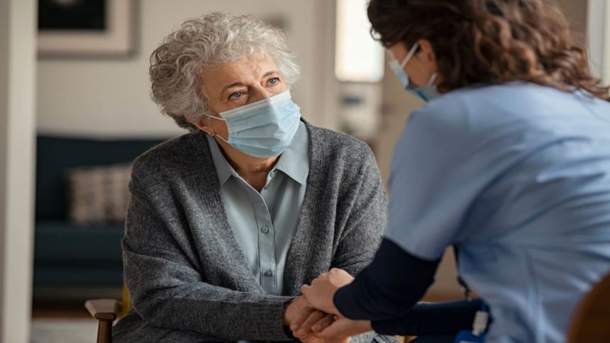 Home caregiver and patient share a compassionate gaze
