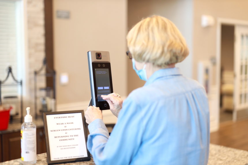woman using check-in technology