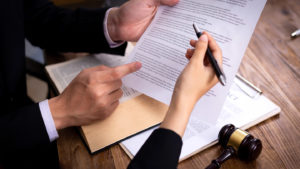 Closeup of hands and court agreements
