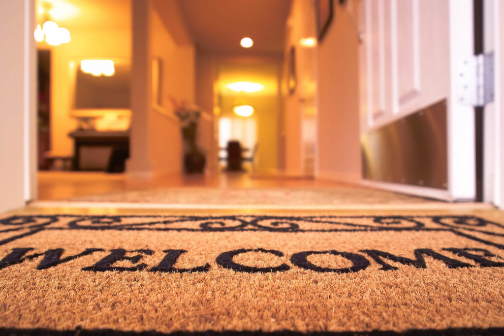 GettyImages-157165670 welcome mat (1)