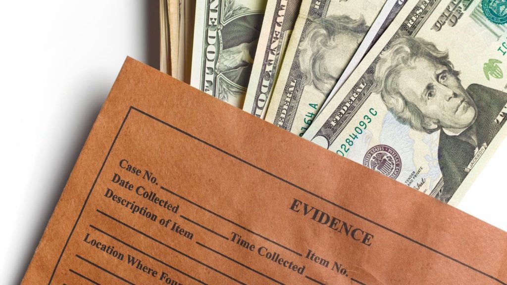 evidence sheet with money in it