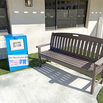 park bench and newspaper box