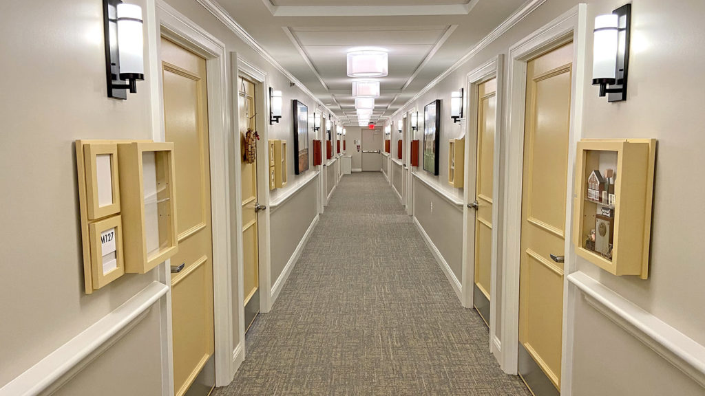 color coded (yellow) hallway in memory care wing
