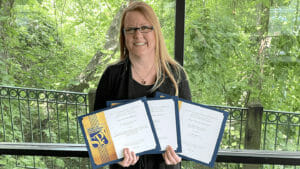 Lois Bowers holds three awards.