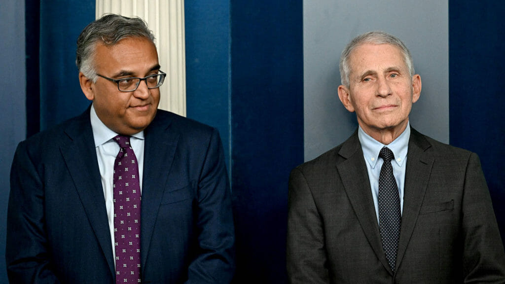 COVID-19 Response Coordinator Dr. Ashish Jha (L) and National Institute of Allergy and Infectious Diseases Director Anthony Fauci