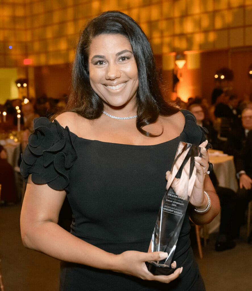 Fatima Feliciano poses with her award.