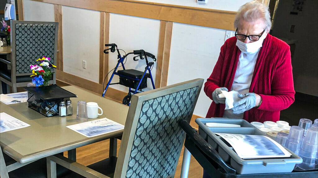 Assisted living resident helps out around campus