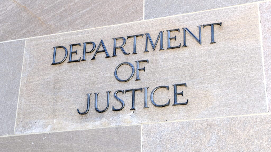 Department of Justice sign, Washington DC, USA. Many law enforcement agencies are administered by the DOJ, including the FBI, DEA and Federal Bureau of Prisons