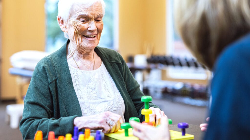 Elderly woman at occupational therapy appointment