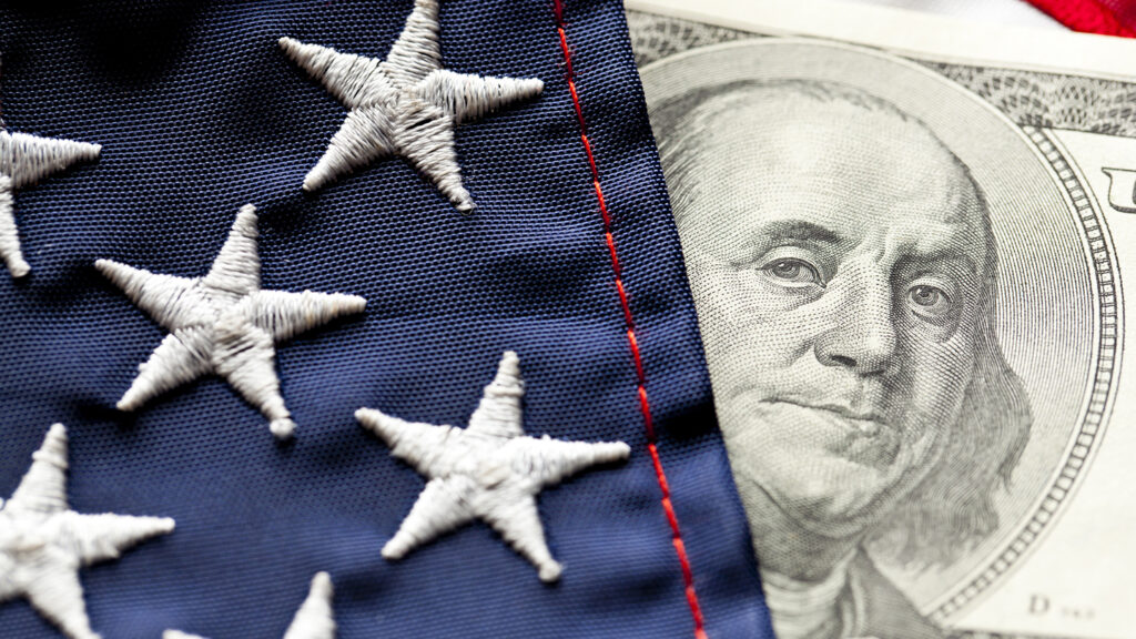 Close-up of Money and Flag.